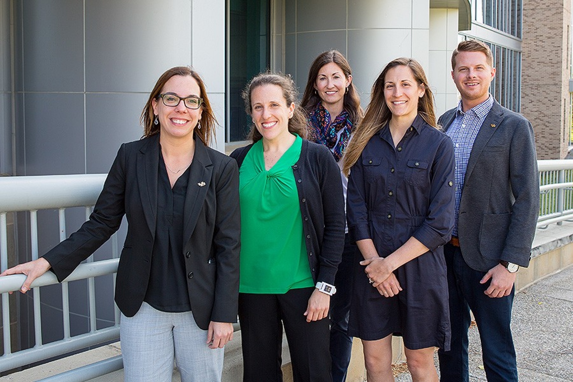 Members of the LGBTQ Faculty and Staff Association outside Kapoor Hall. 