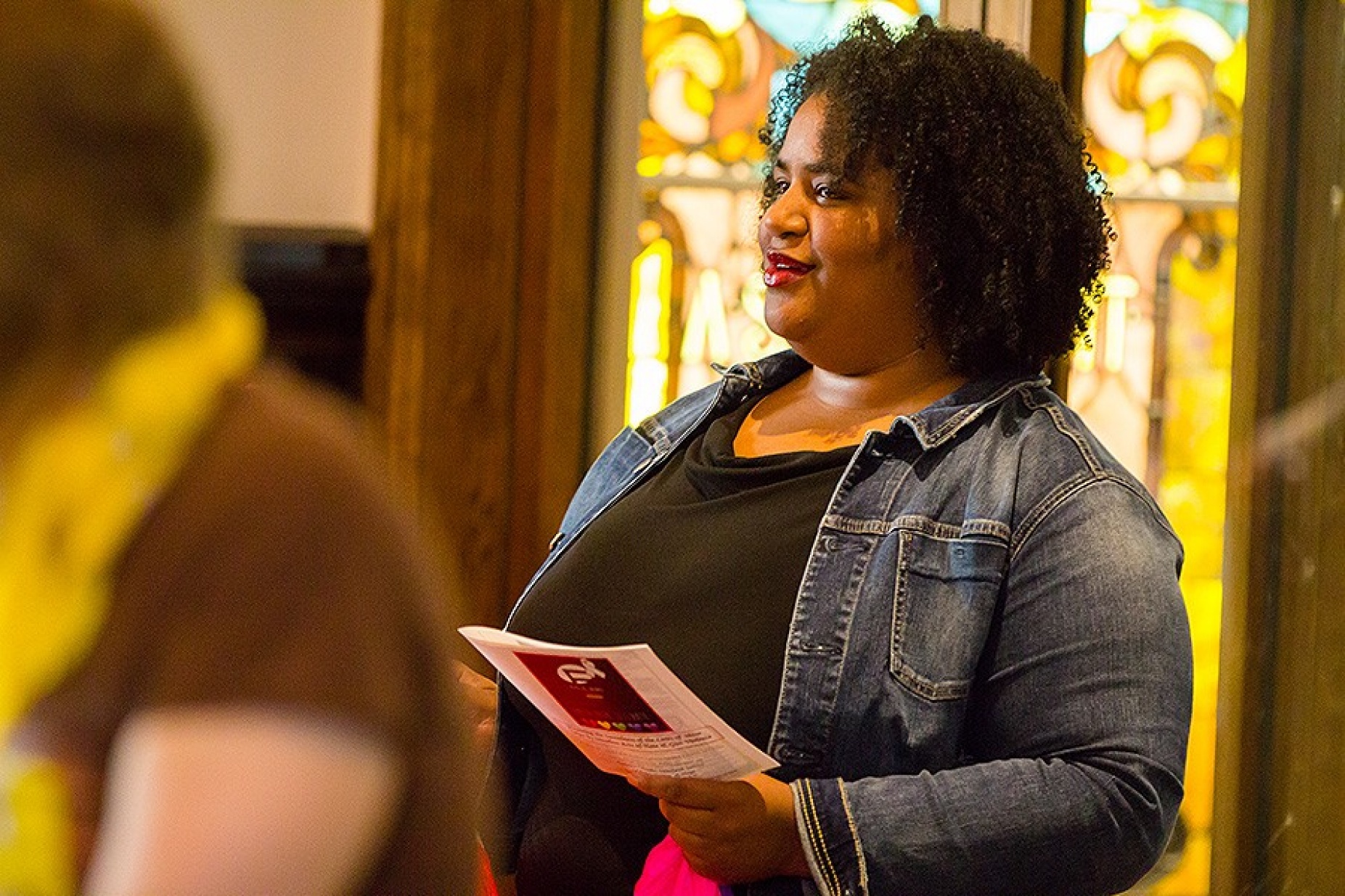 Danielle Johnson participates in an interfaith service commemorating the Pulse Nightclub victims. 