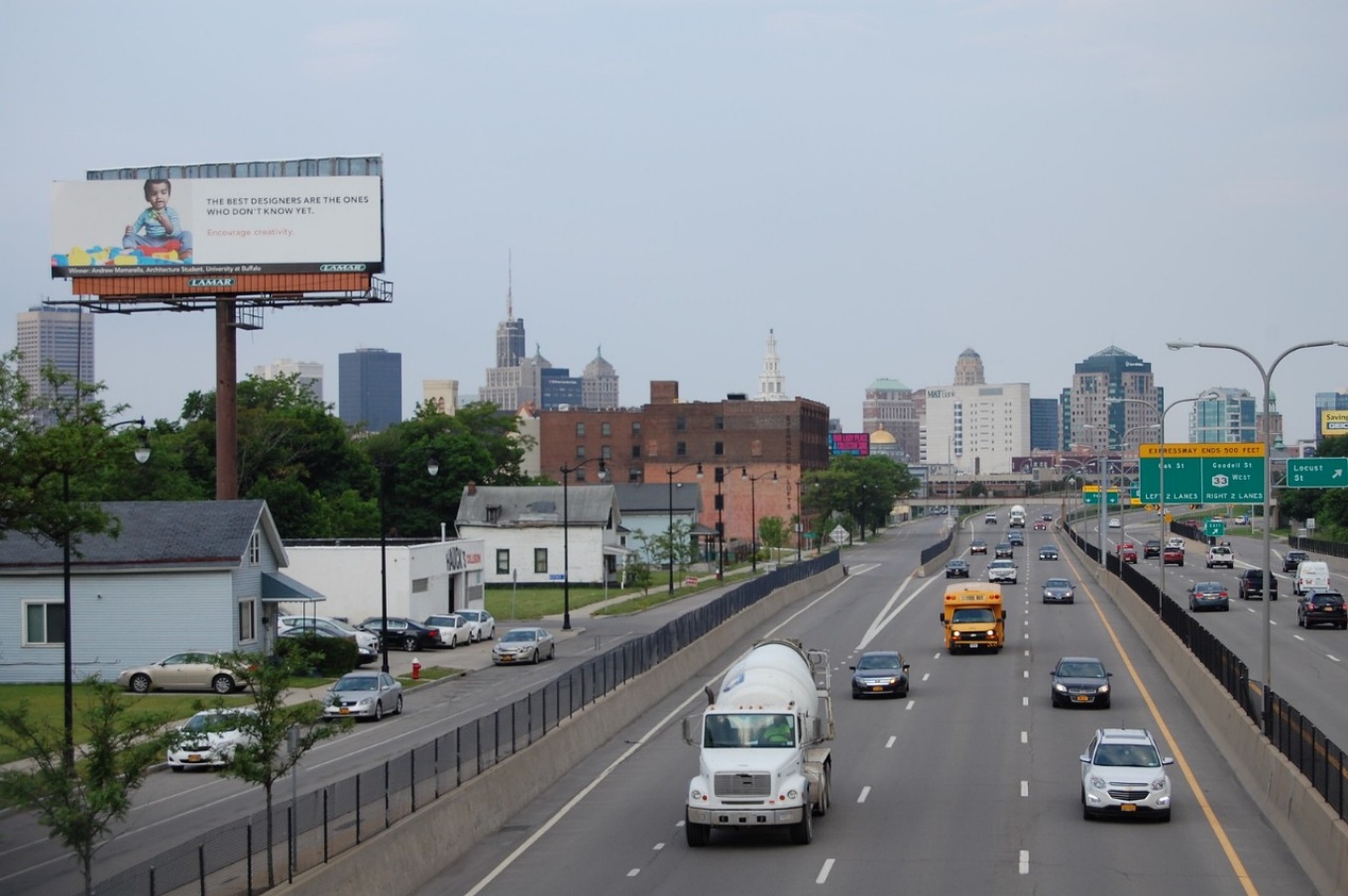 Andrew Mamarella's winning billboard is visible along the Kensington Expressway. 