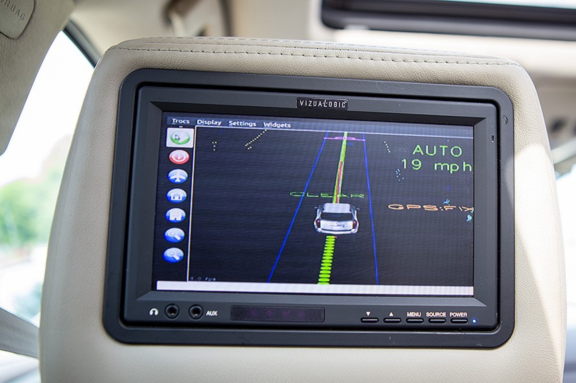 Display screen inside the SUV indicates that the car is in "auto" mode. 