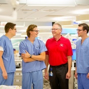 Marshall, Chris, Len and Jon Binns together in Squire Hall. 