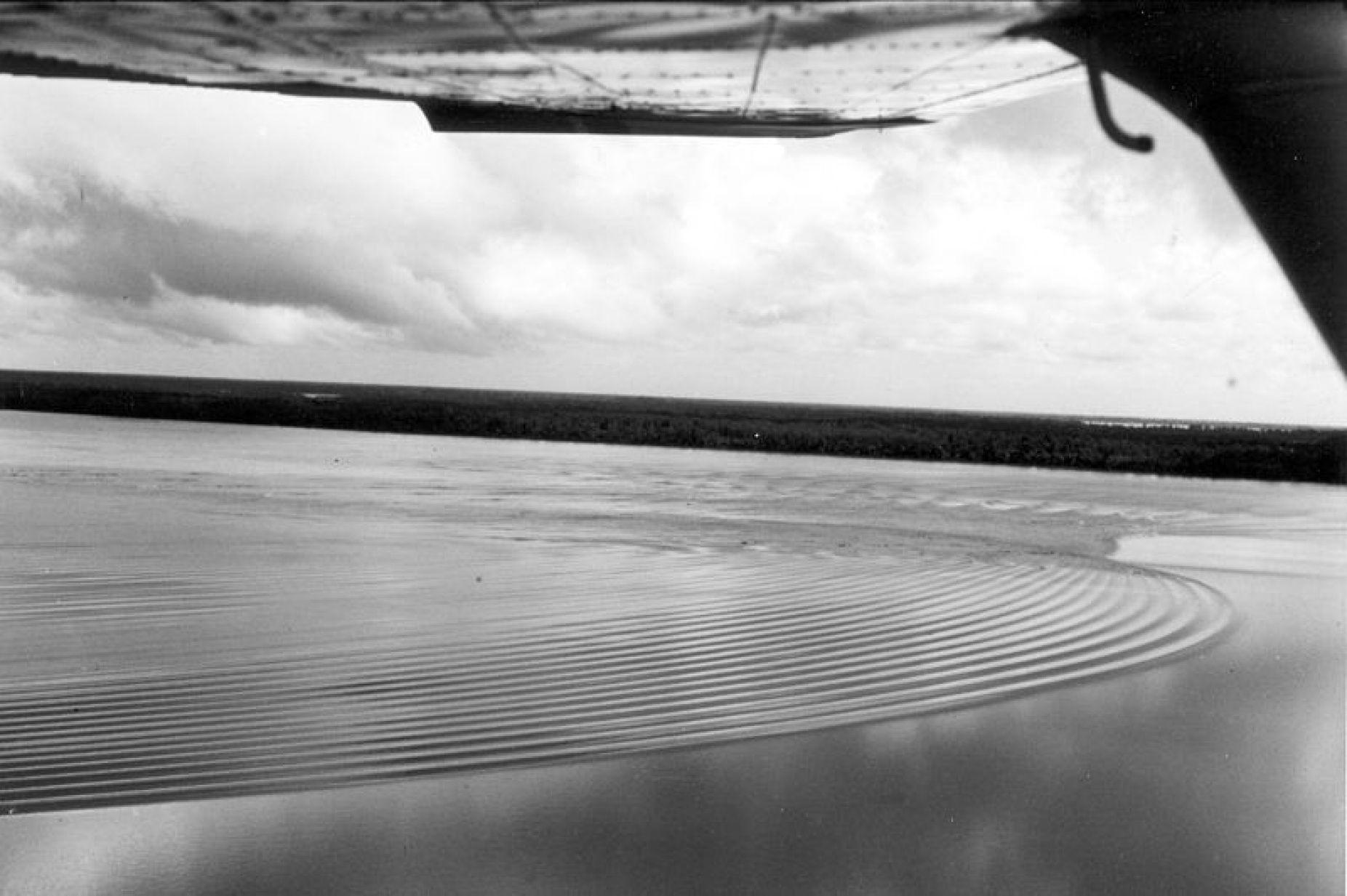 Undular bore and whelps near the mouth of Araguari River, Brazil. 