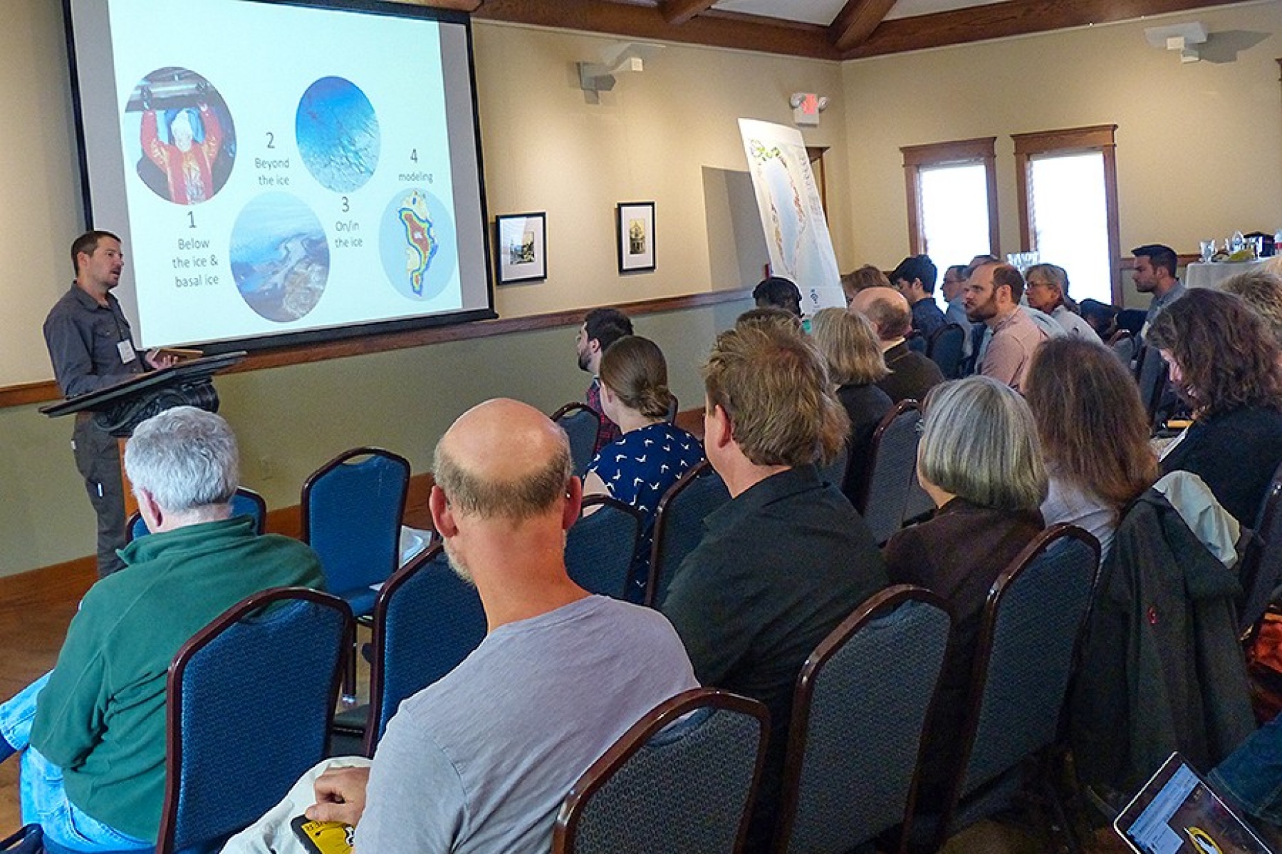 Jason Briner addresses climate scientists from around the world during the NSF workshop, "How Stable is the Greenland Ice Sheet?". 