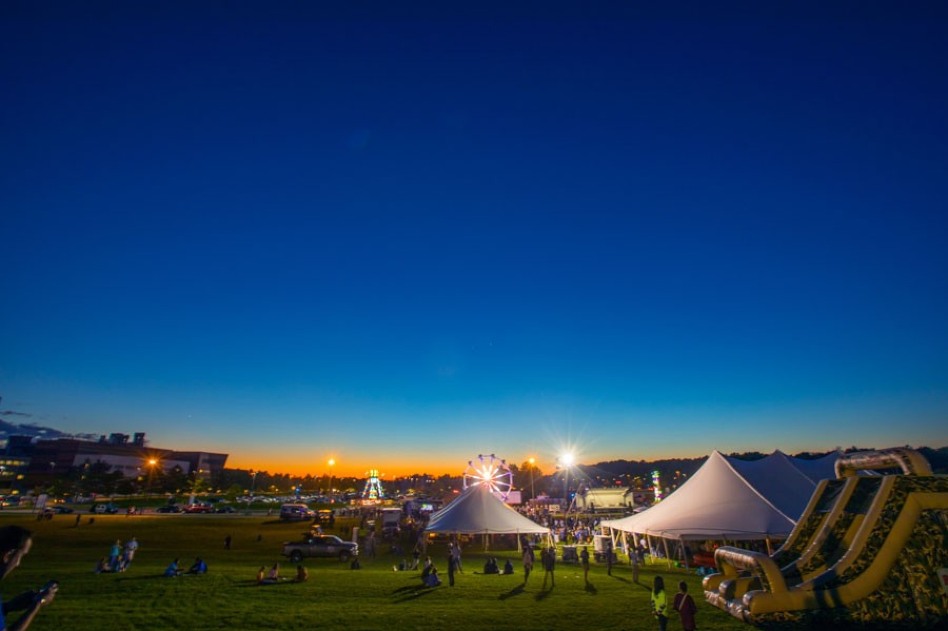 Homecoming carnival on the shores of Lake LaSalle. Photo: Douglas Levere. 