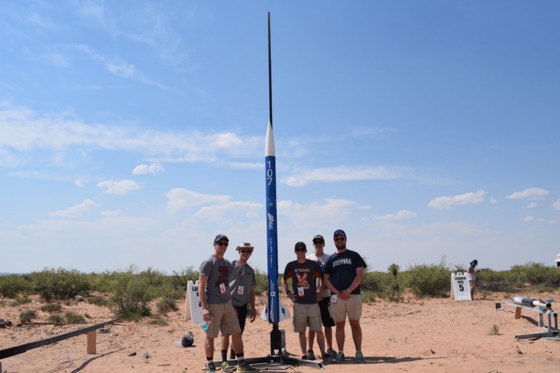 The UB SEDS team takes a group photo after putting the rocket on the launch rail and just before they inserted the igniter in the rocket and left the launch site. From left are: August Bartoszewicz, Owen Langrehr, Peter Wilkins, Sayre Stowell and Jonathan Przybyla. 