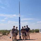 The UB SEDS team poses for photo after putting the rocket on the launch rail. From left: August Bartoszewicz, Owen Langrehr, Peter Wilkins, Sayre Stowell and Jonathan Przybyla. 