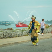 A runner ran last year's Tunnel to Towers 5K race in his firefighter gear. 