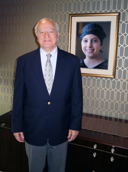 Allen Barnett, co-founder of Athenex, in Athenex&rsquo;s boardroom with a portrait of his granddaughter Carly, whom he lost to brain cancer. 