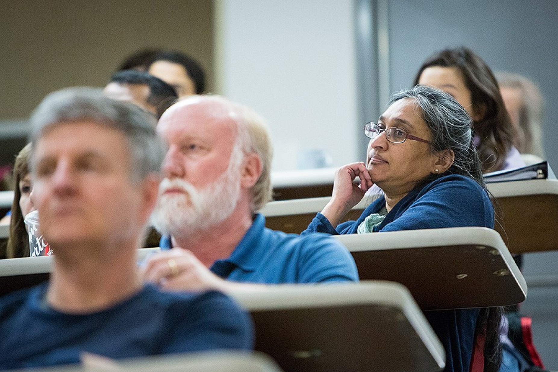 Faculty member, XX, listens attentively as Rep. Brian Higgins discusses a wide range of topics.