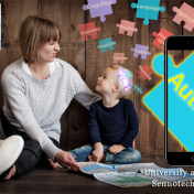 mother and son with puzzle pieces representing autism. 