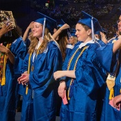 2017 graduates turn their tassels from the right to left side of their caps after receiving their diplomas. 