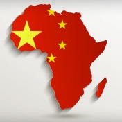 Illustration of China's influence in Africa—a Chinese flag in the shape of the African continent. 