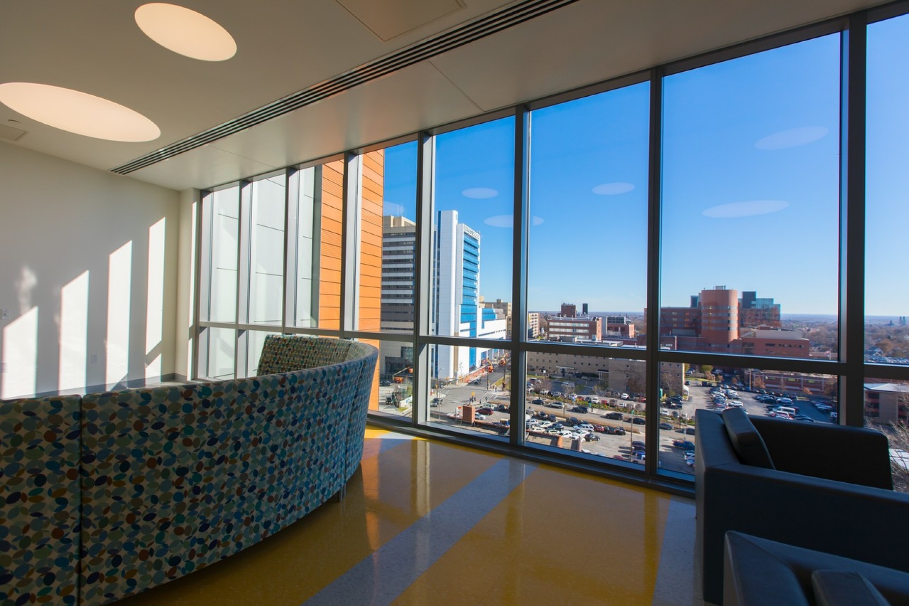 View of downtown Buffalo skyline and neighborhoods from inside the Jacobs School of Medicine and Biomedical Sciences.