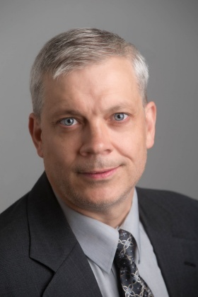 headshot of John Hall. 