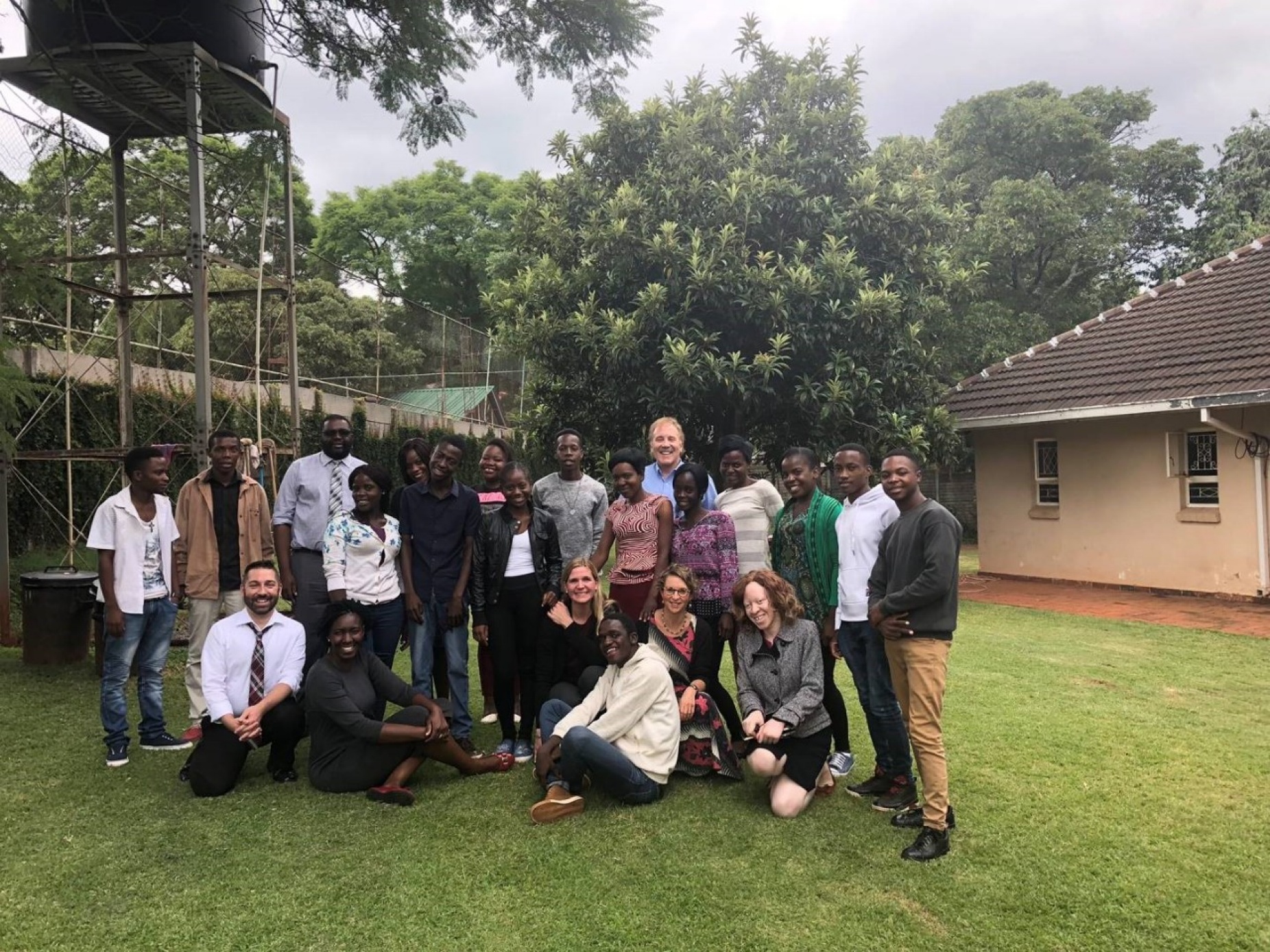 Faculty of the UB Center for Integrated Global Biomedical Sciences with the Africaid Adolescent Support Group in Zimbabwe. 