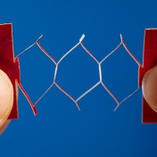 A kirigami-inspired electronic circuit being increasingly stretched. 