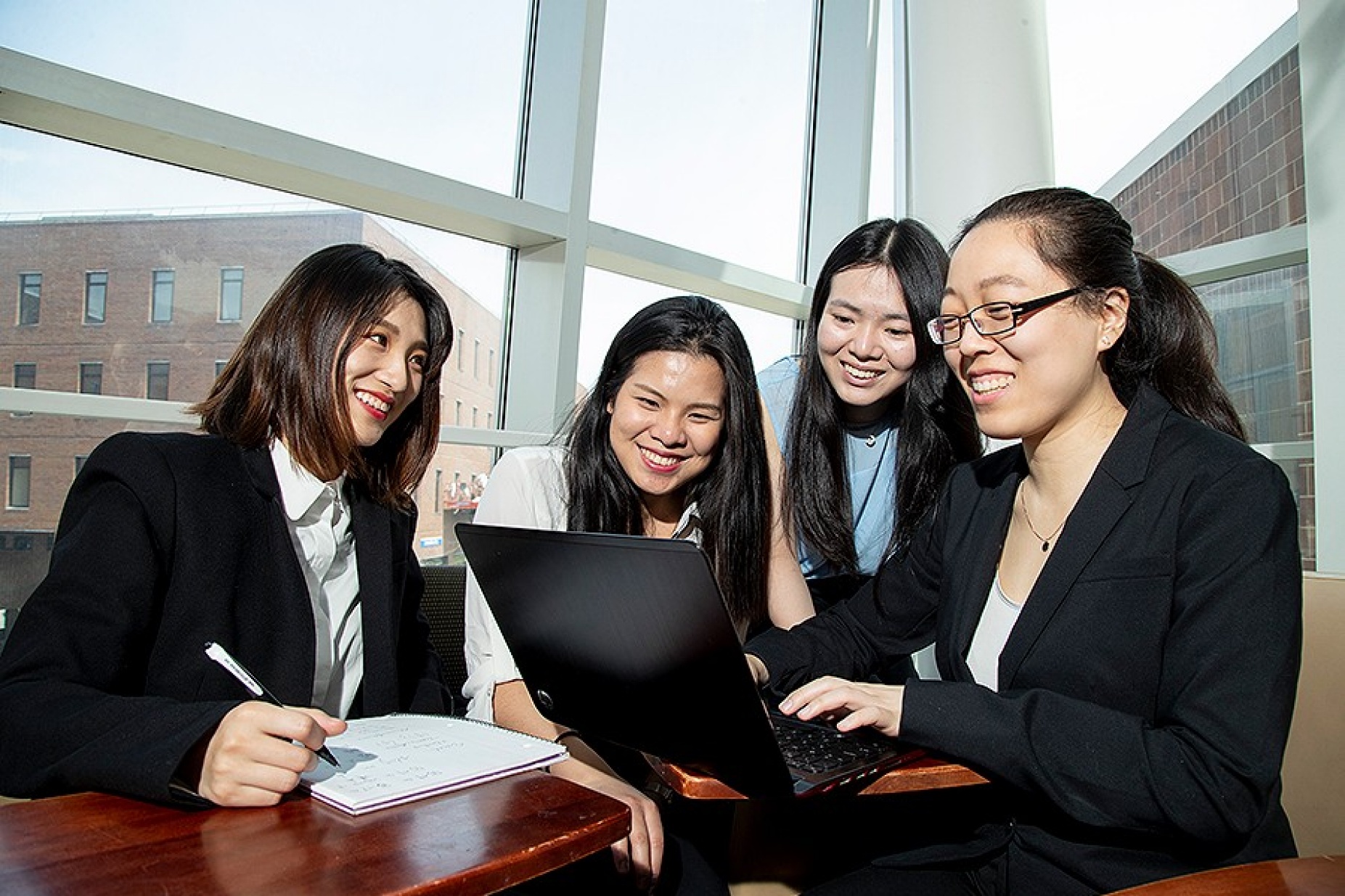 accounting graduates Wei Wang, Joey Chen, Jeanna Huang and Jennifer Wu, who took part in Data Analysis for Accountants class. 