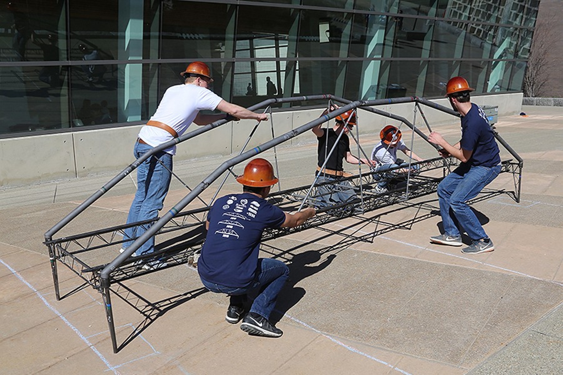 The steel bridge team times their build days before competing. 