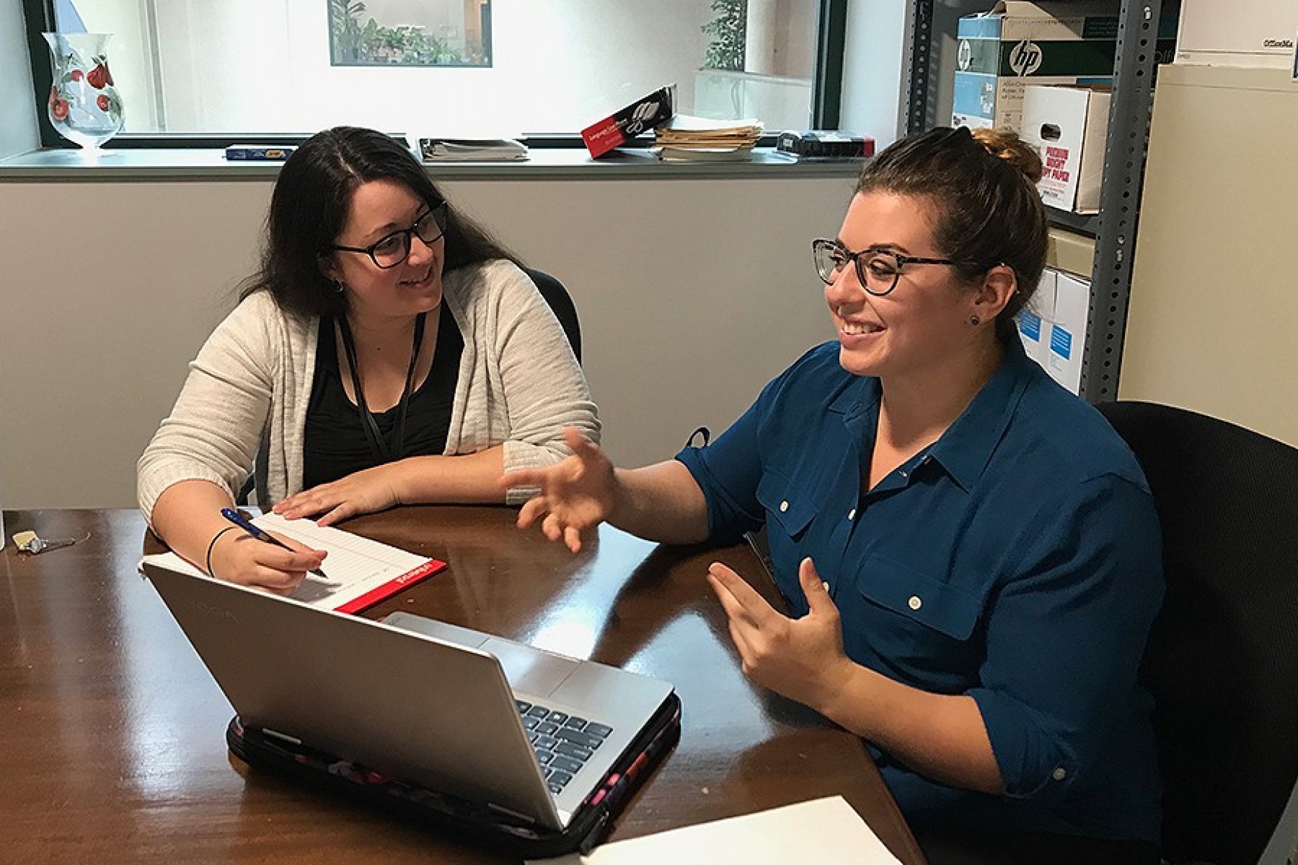 Bethany Cereo (right) trains a new FJC advocate.
