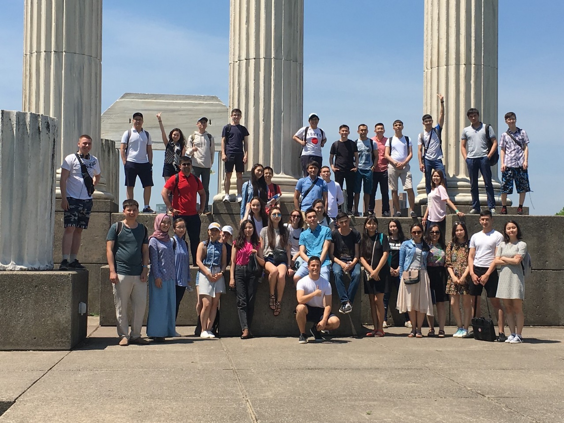 UB hosted 38 students from Nazarbayev University in Kazakhstan. The students posed together in front of the pillars at Baird Point. 