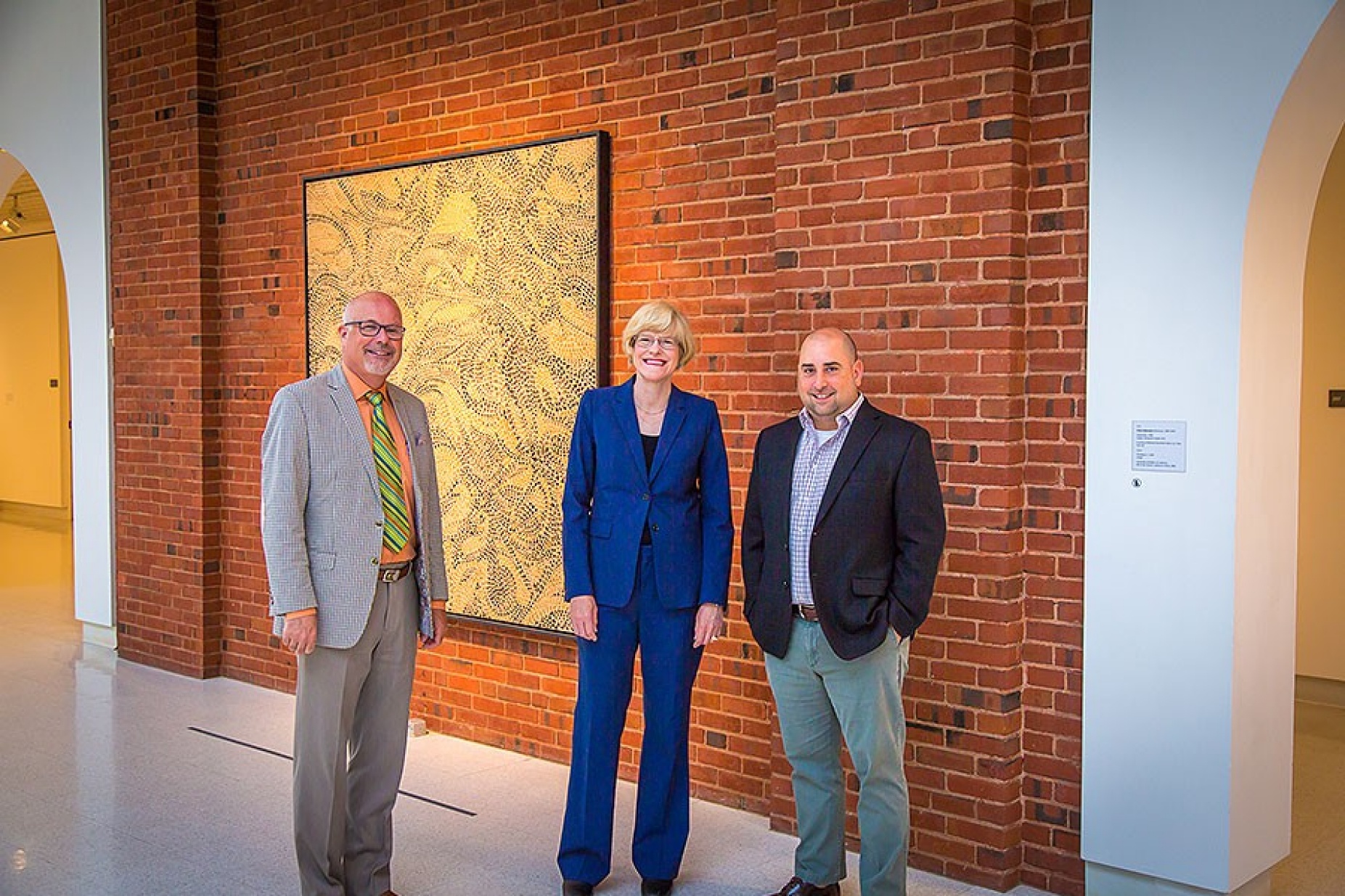 Pictured at the Anderson Gallery are, from left, Brice Bible, vice president and CIO; CAS Dean Robin Schulze and Robert Scalise, acting director of the Anderson Gallery.