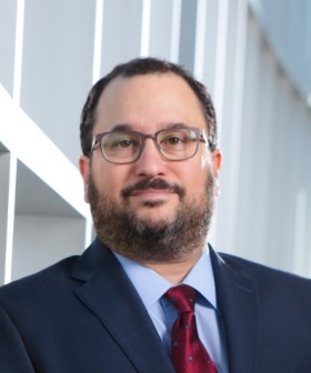 headshot of Robert Adelman. 