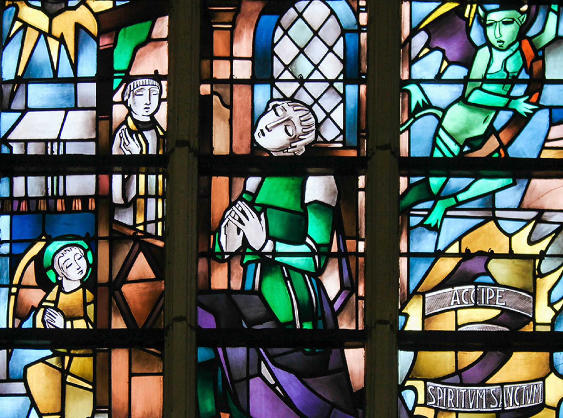 Stained Glass in the Church of Tervuren, Belgium, depicting the Sacrament of Penance or Confession. 