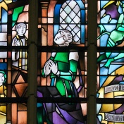 Stained Glass in the Church of Tervuren, Belgium, depicting the Sacrament of Penance or Confession. 