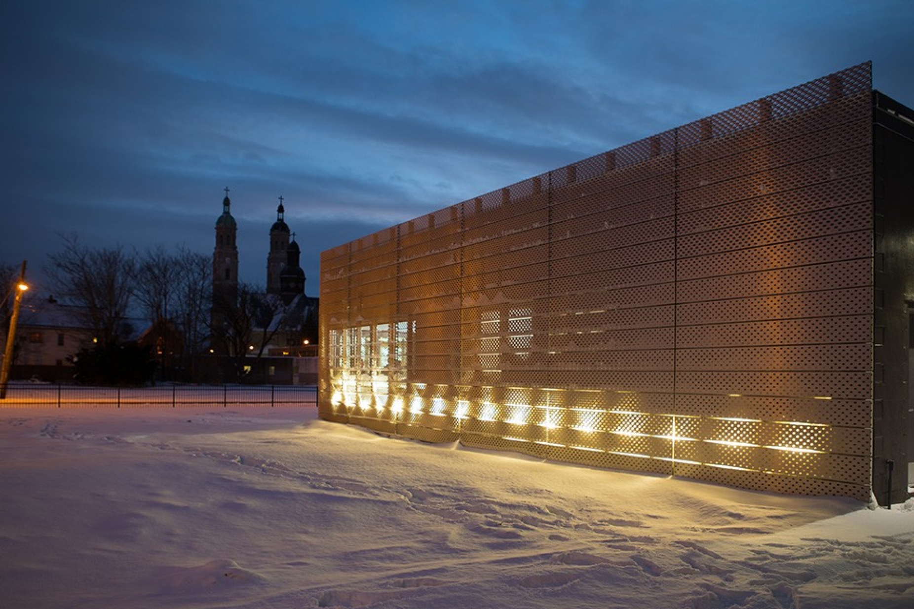 View of the metal facade of Light/Station. 