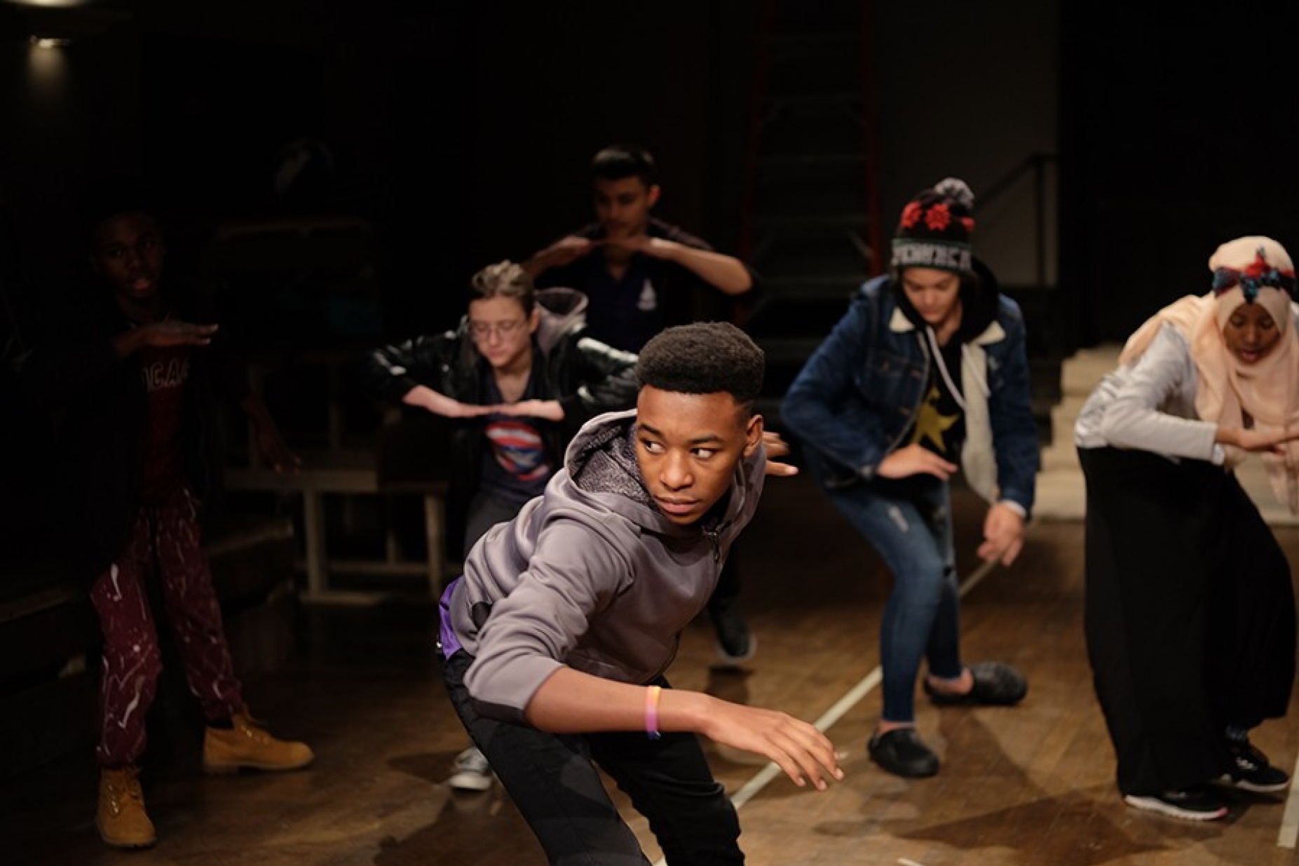 Lafayette High School student practice their performance of "Manmade Earth.".