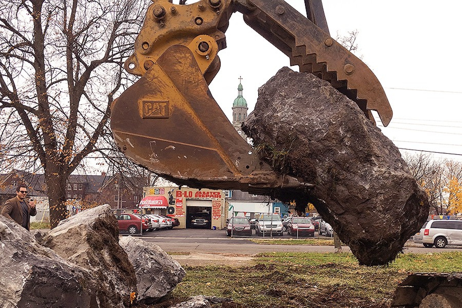 Large rock being moved into position as part of the Light/Station rock sculpture.