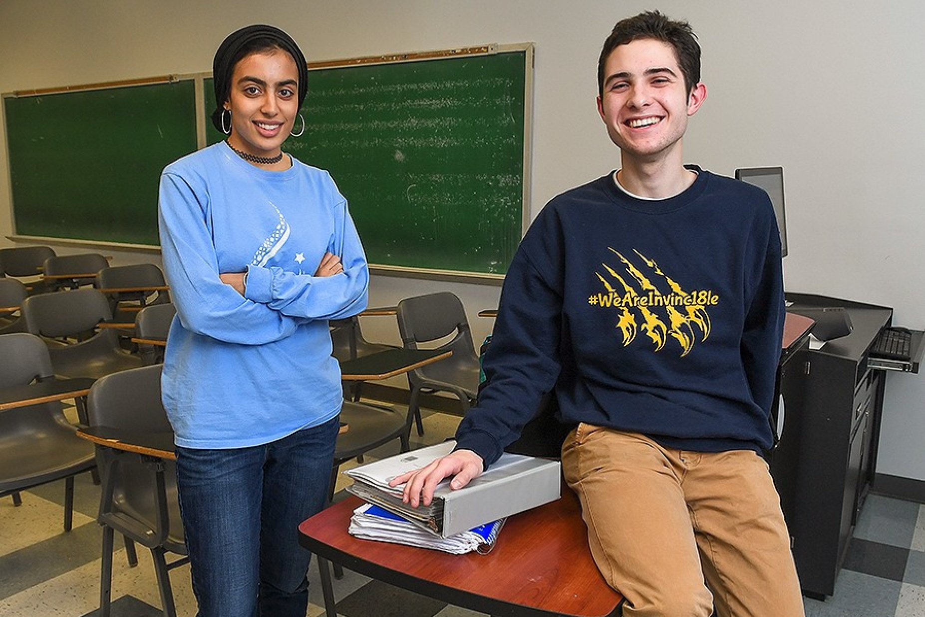 UB undergraduates Sana Zubairi (left) and James Zielinski both participate in the UB Teach program that enables students to complete their undergraduate work and earn a teaching certificate in five years. 