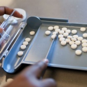 pill counter filled with pills. 