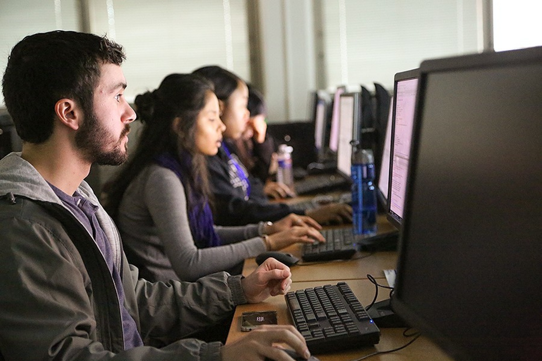 Students at computers during the BERD winter institute.