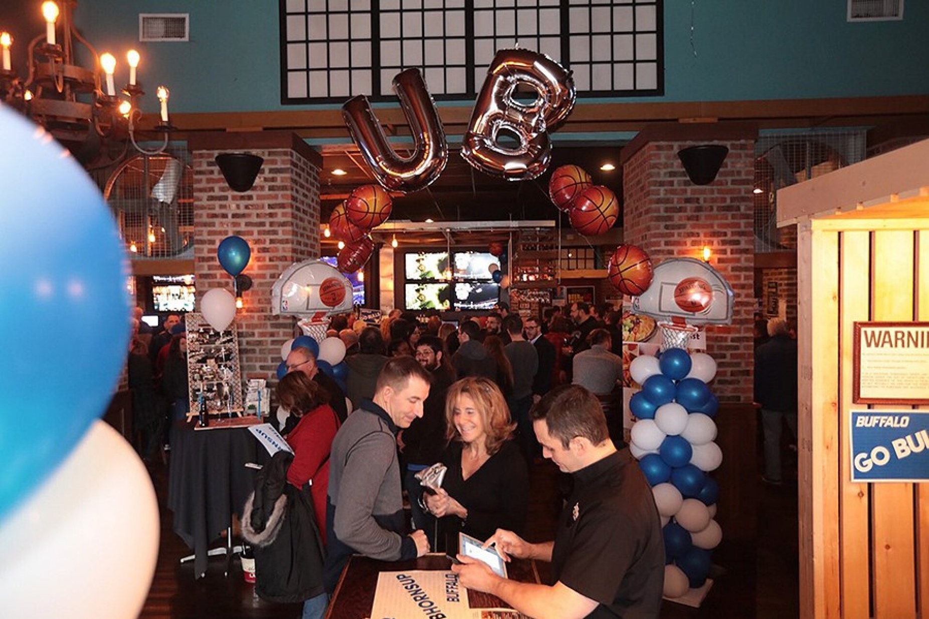 UB Bulls fans arrive at Santora's to cheer on their teams.