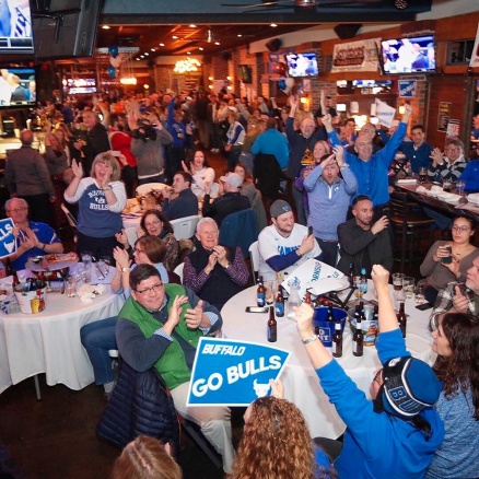 Zoom image: A packed house cheers the teams on to victory. Photo: Douglas Levere 