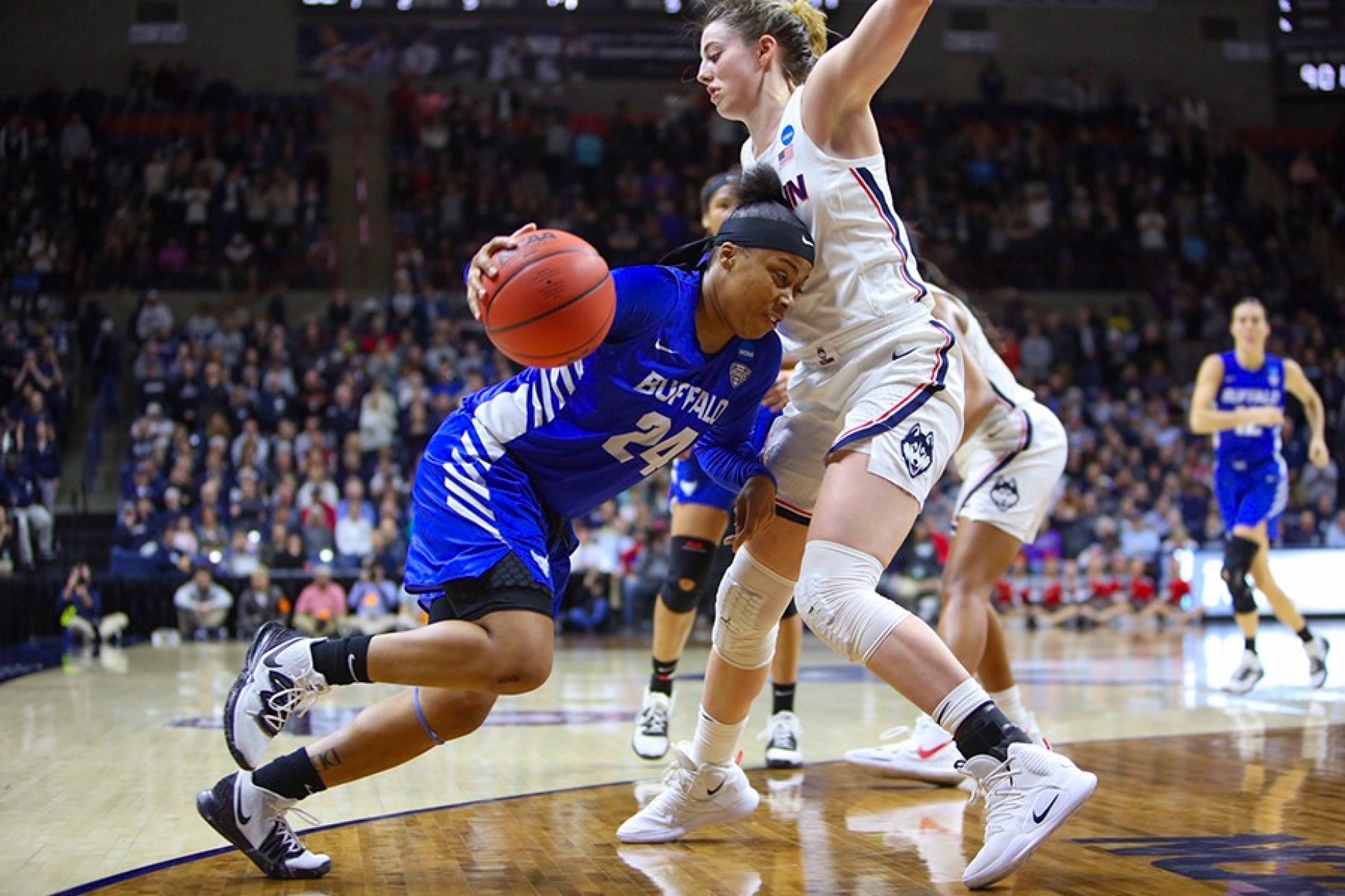 Cierra Dillard drives to the basket. 