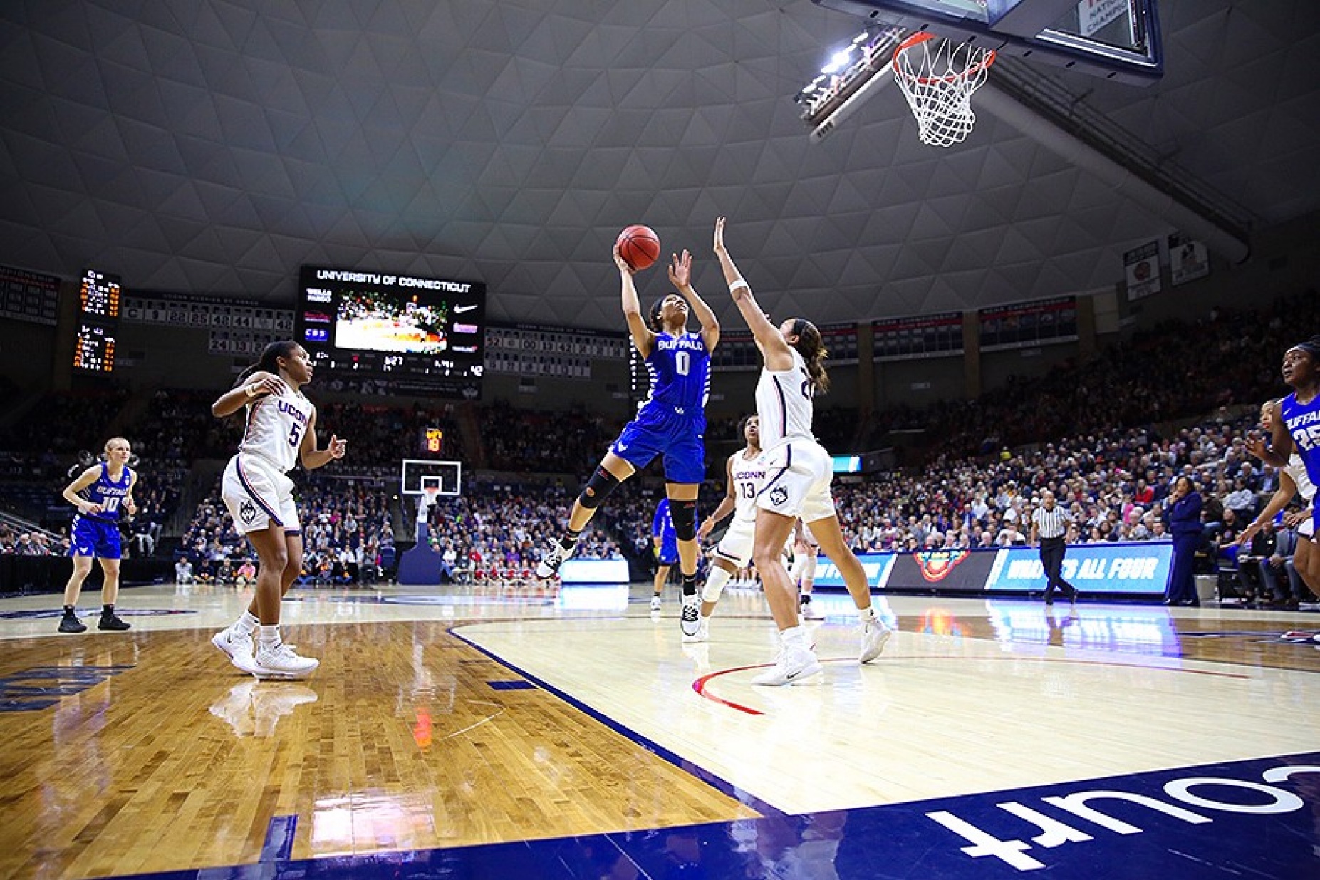 Summer Hemphill goes in for a shot against the Huskies. 