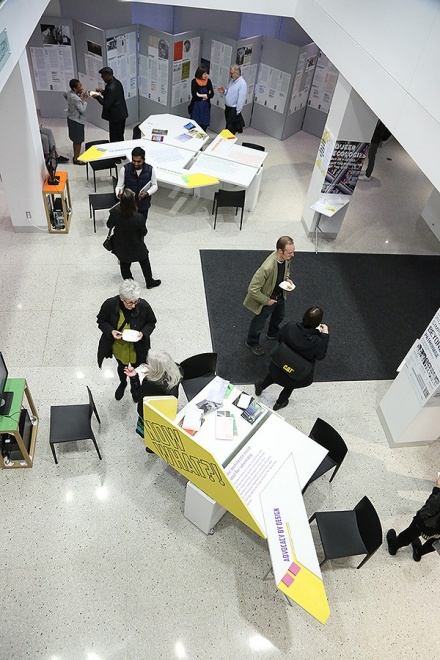 Community members visit the "Now What?!" exhibit in Hayes Hall. 