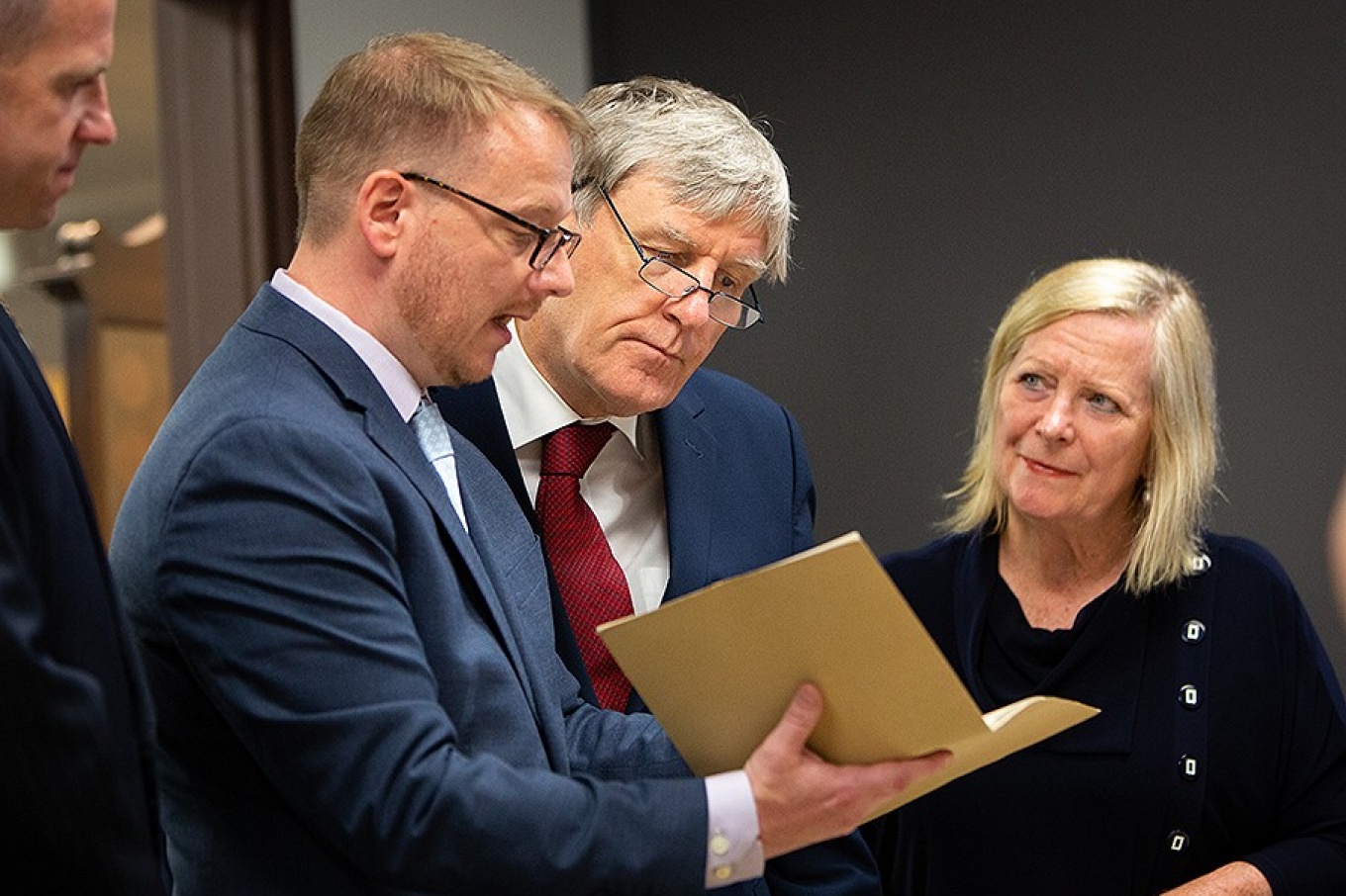 James Maynard, curator of UB Poetry Collection, discusses one of the pieces of the UB James Joyce Collection with Irish Ambassador, Daniel Mulhall. 