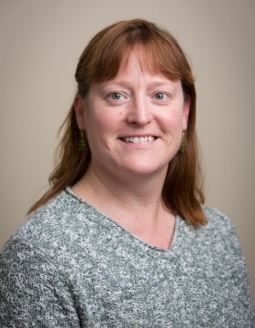 Portrait of UB planetary geologist Tracy Gregg. 