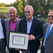 UB Provost Charles Zukoski, UB alumni David Pfeil and Kenneth Colwell, and UB President Satish K. Tripathi. 