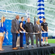 Ribbon cutting ceremony for the Murchie Family Field House. 