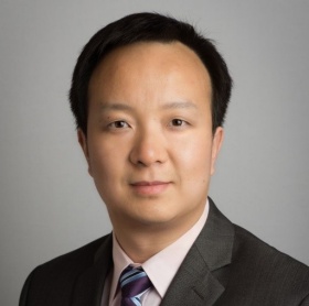 headshot of Zhanpeng Jin. 