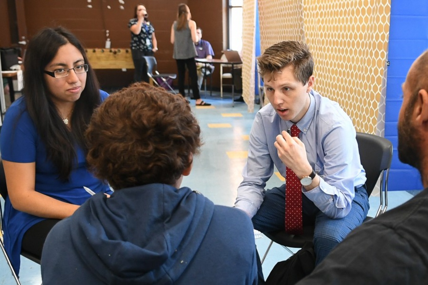 UB medical students meet with a patient.