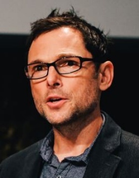 headshot of David Herzberg. 