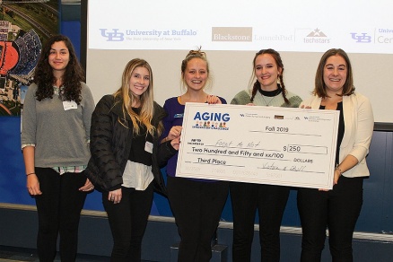 Speech pathology and audiology student Michelle Iliev and OT students Jen Gordon, Allison Bigg, Kayla DeLucia and Shana Martakis won third place for Forget Me Not Mobility Sensor. 