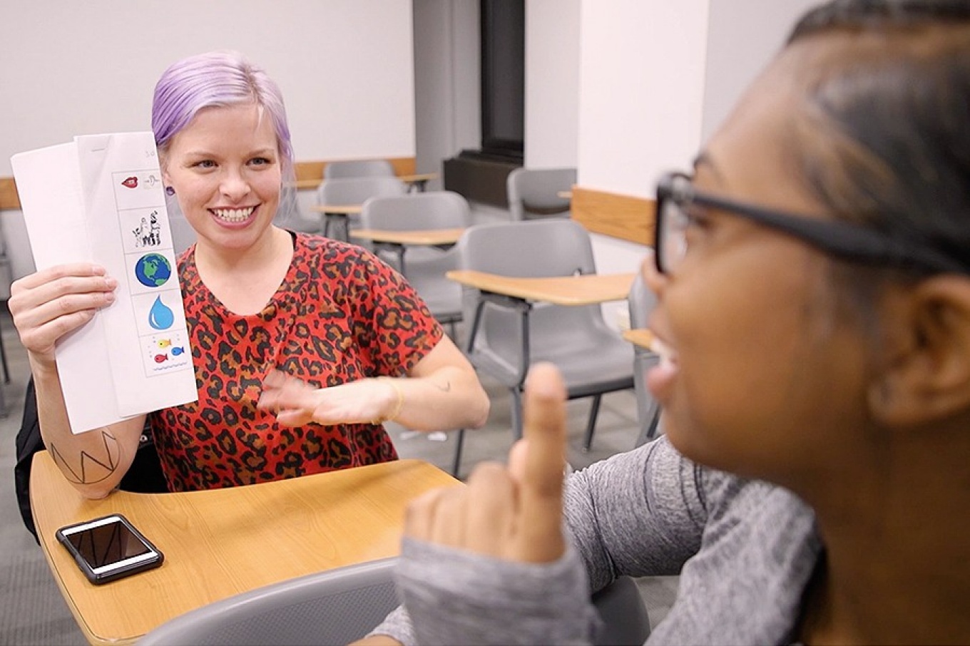 American studies instructor Jodi Maracle working with a Native language student. 