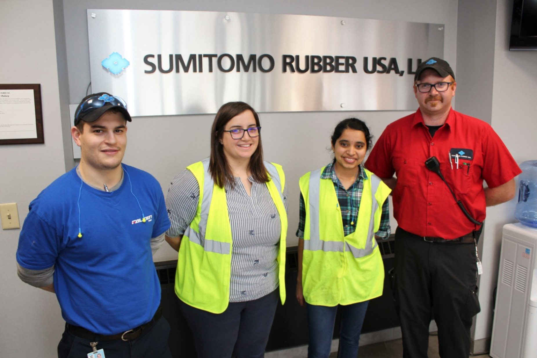 UB student Black Belt candidates Fanni Kozma and Manimanjari “Manjari” Vemula pose with their supervisors at Sumitomo Rubber USA, Anthony Lauria and Christopher Holzmann. 