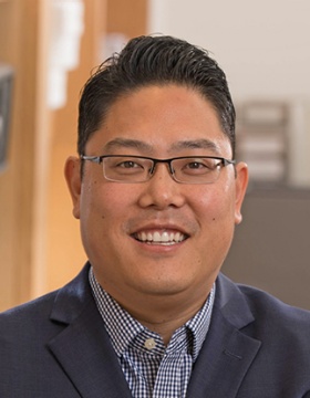 headshot of Brian Tsuji. 